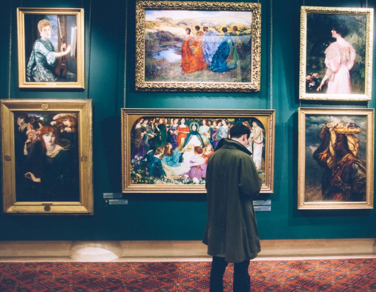 Art Gallery wall with man stood in front