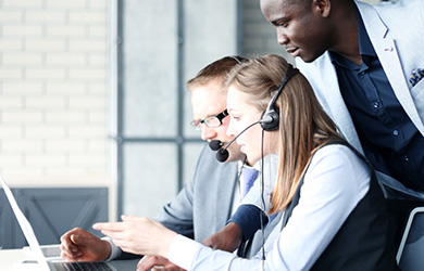 2 phone operators with headsets on